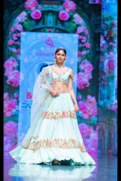 The Hummingbird Gardenia Tiered Lehenga Set In Aqua Green