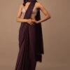 Wine Satin Saree With Fringes On Pallu Paired With Hand Embroidered Bustier