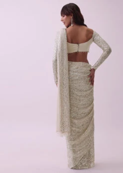 Off-White Sequins Saree And Blouse With Cowl Sleeves And Tassels -Lillys Clothing Shop Kalki1247
