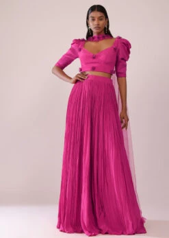 Rani Pink Lehenga And Blouse With Bishop Sleeves And Hand Embroidered Brooch