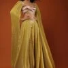 Mustard Yellow Lehenga And Crop Top In Long Cape Sleeves, Crafted In Crush With A Side Zip Closure