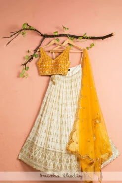 Ivory Lehenga With Honey Yellow Mirror Blouse & Dupatta