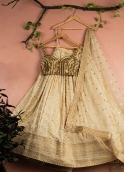 Beige Multipanel Gold Lehenga Set With Gold Blouse