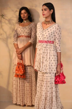 Hot Pink Printed And Embroidered Potli -Lillys Clothing Shop RUSTANDPINKIPOTLI2 1000x1500 66ee94bc c218 4857 a79c 5393dca5f2ff 1