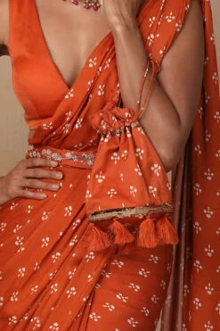 Rust Printed And Embroidered Potli